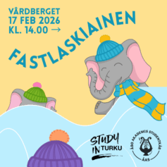 Fastlaskiainen Åbo 2026 En elefant som vinkar bakom en snödriva och har en blå mössa och en blå-gul halsduk på sig. En mindre elefant gömmer sig bakom snödrivan och det syns bara en grön mössa och öron.