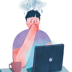 en människa sitter framför en bärbar dator och har ett regningt moln över sitt huvud